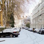 London Winter Festivity - London streets covered with snow on sunny day