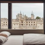 London Hotel - white bed mattress and two pillows