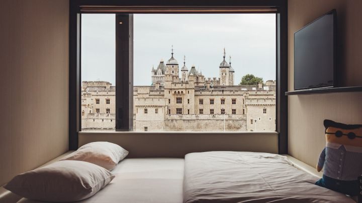 London Hotel - white bed mattress and two pillows