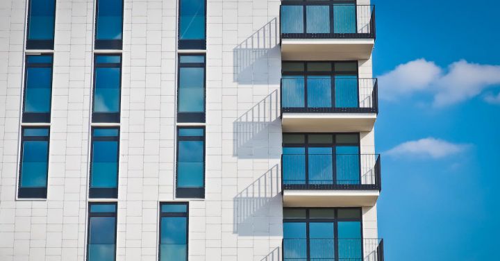 Apartment - Low-angle Photography of Gray Concrete Building