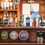 Pubs - Blue Harp Decor on Brown Wooden Table