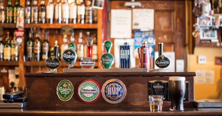 Pubs - Blue Harp Decor on Brown Wooden Table