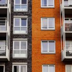 Apartment - Photography of Orange and Gray Building