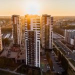 Apartment - High Angle Photography of High-rise Buildings Near Road during Golden Hour