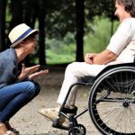 Wheelchair - Woman on Black Folding Wheelchair