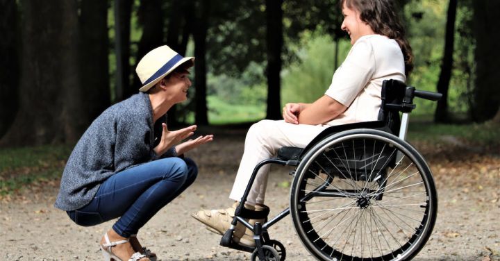 Wheelchair - Woman on Black Folding Wheelchair